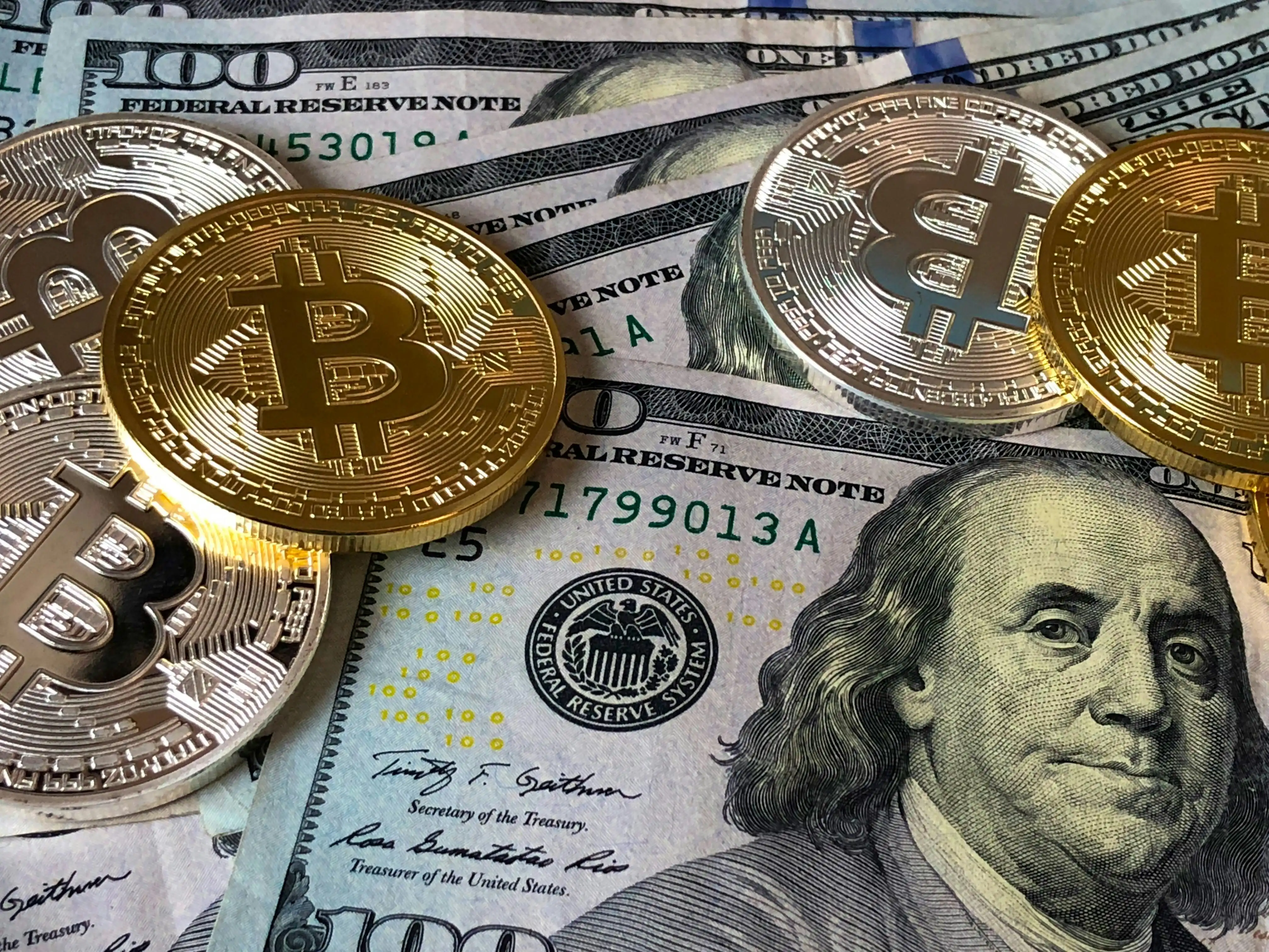 Person analyzing crypto data or exploring blockchain platforms on a digital device
