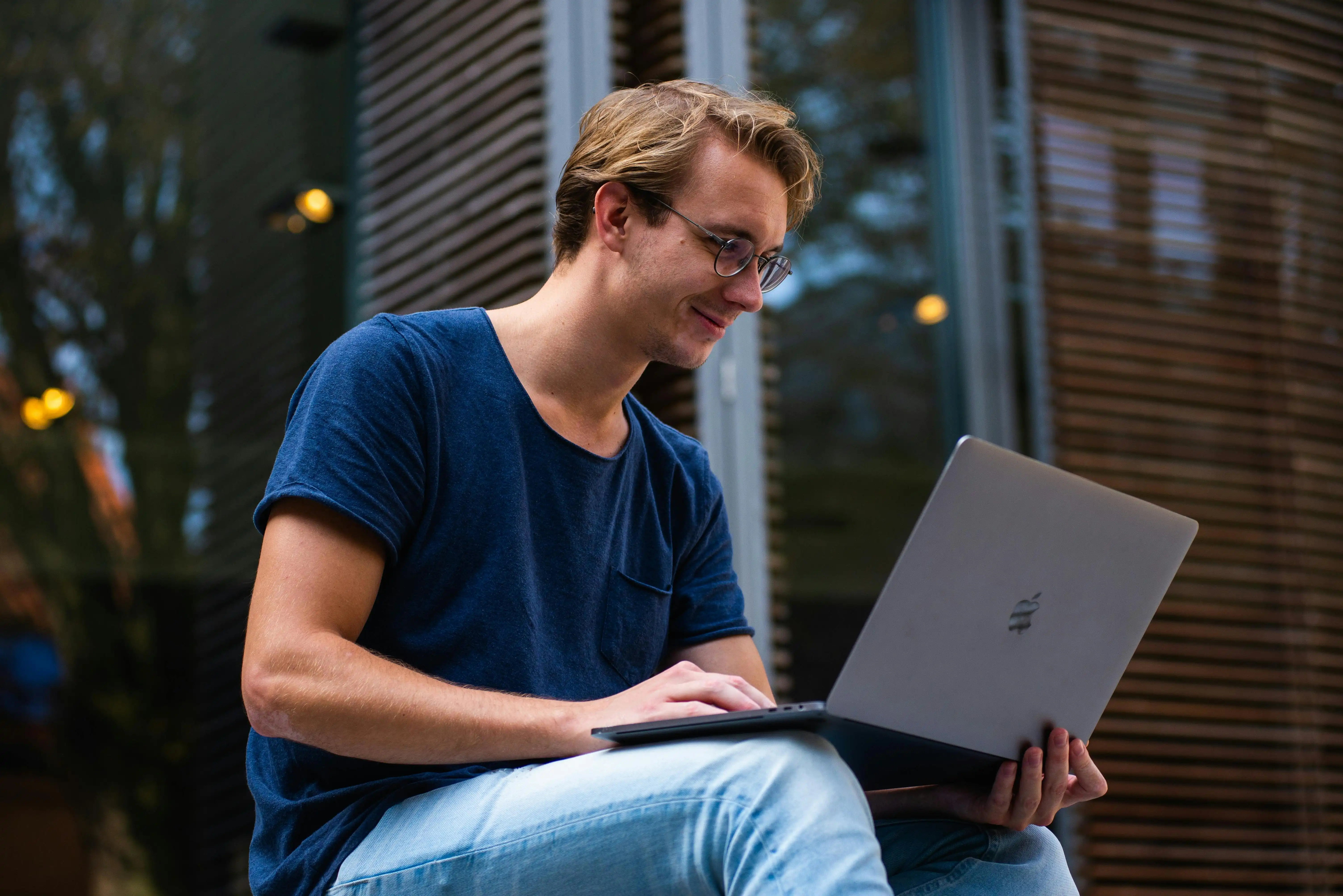 Person analyzing crypto data or exploring blockchain platforms on a digital device