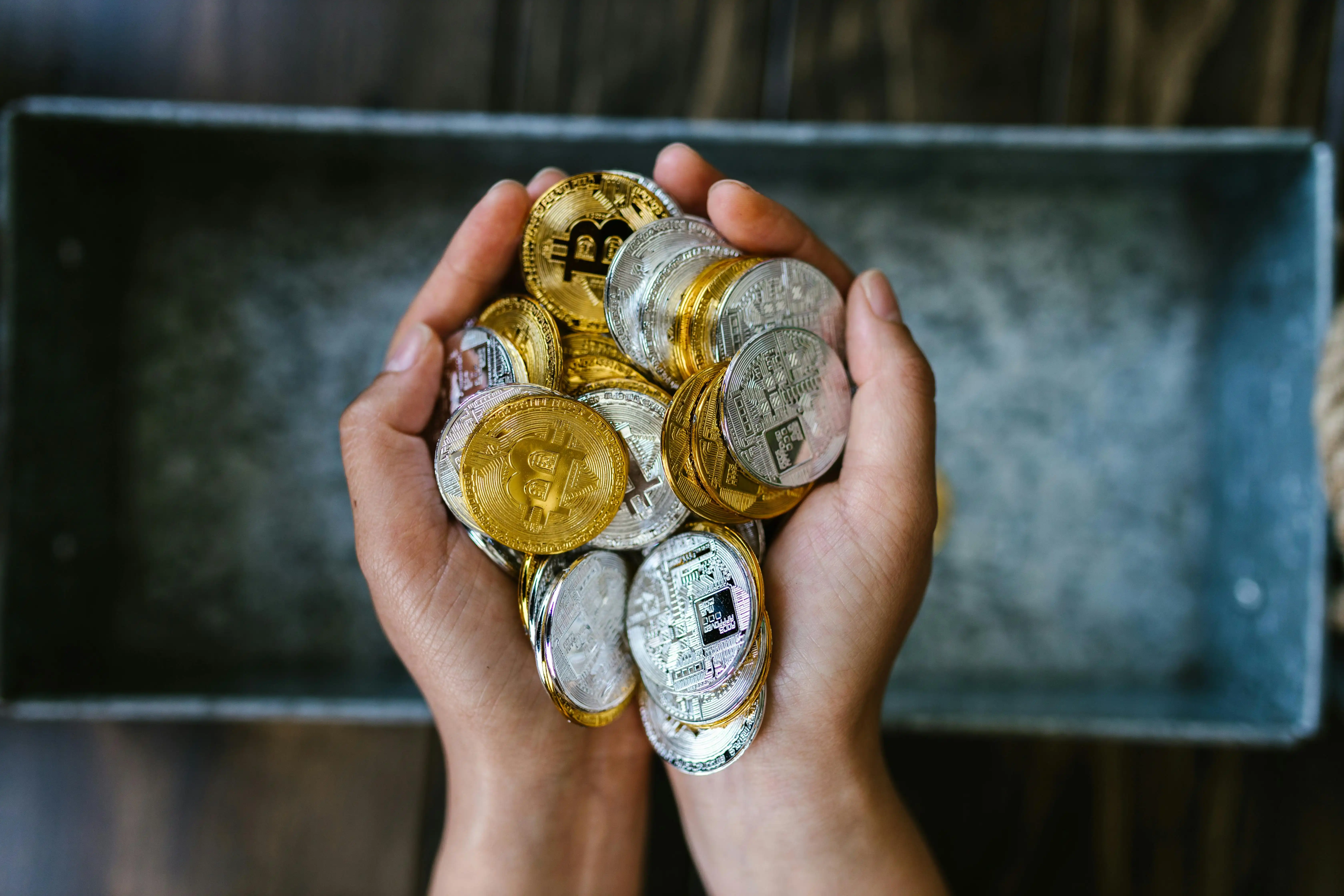 Person analyzing crypto data or exploring blockchain platforms on a digital device